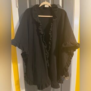 Ruffle trimmed cape